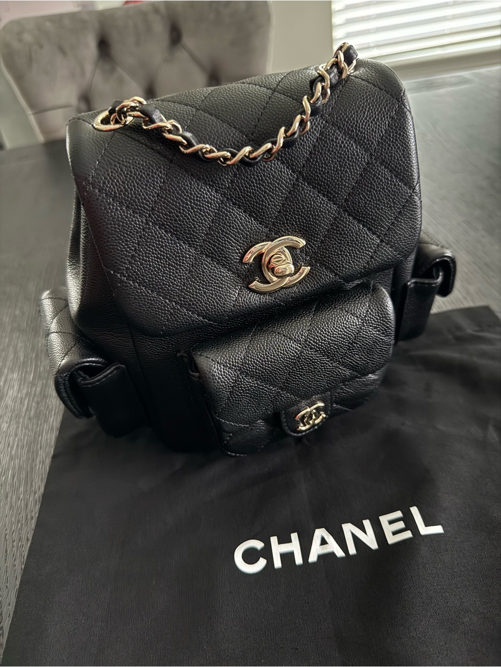 CHANEL Black Quilted Caviar Leather Backpack with Gold Hardware